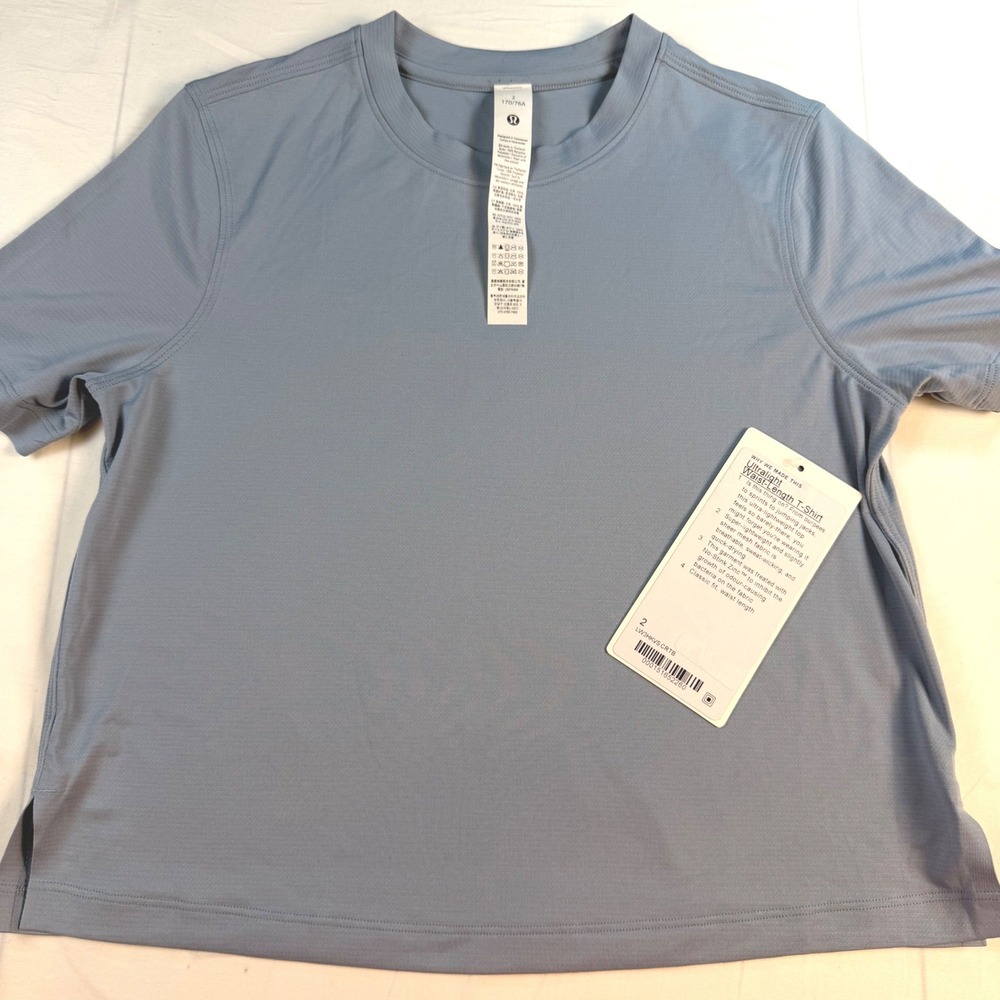 Lululemon Ultralight Waist Length Shirt Womens 2 Blue S/S Athletic Training NWT